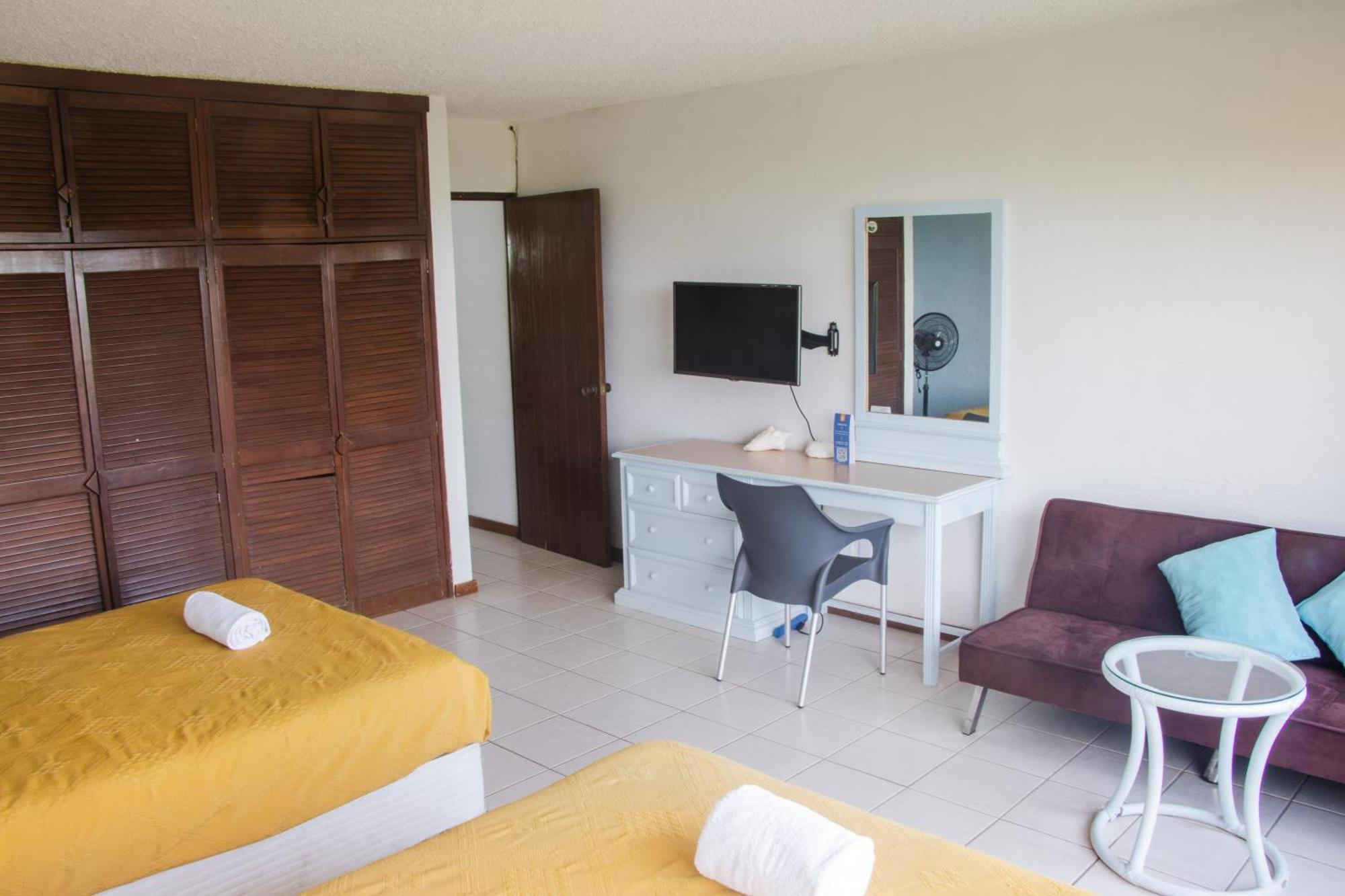 Beachfront Apartments Cancún Quarto foto