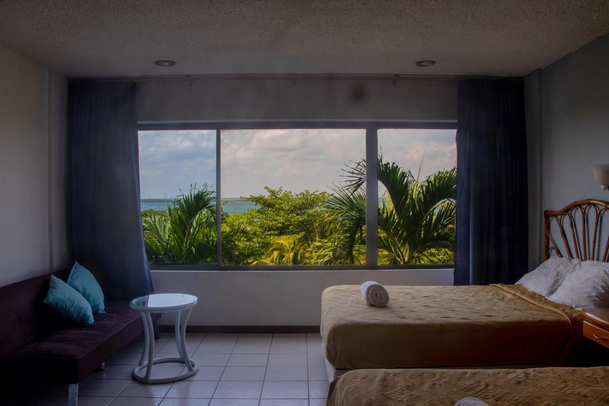 Beachfront Apartments Cancún Quarto foto